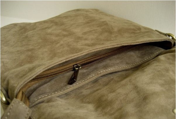 Suede fringe diagonal across package